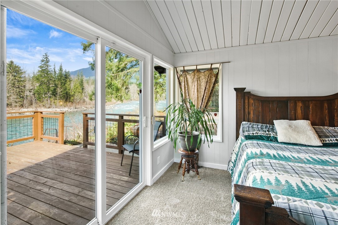 43825 Fir Road Gold Bar, WA 98251 - Photo 18 of 35 a bedroom with furniture and a large window