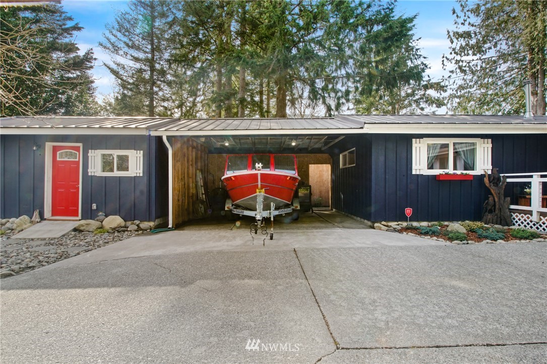 43825 Fir Road Gold Bar, WA 98251 - Photo 27 of 35 a view of a house with a patio and a yard
