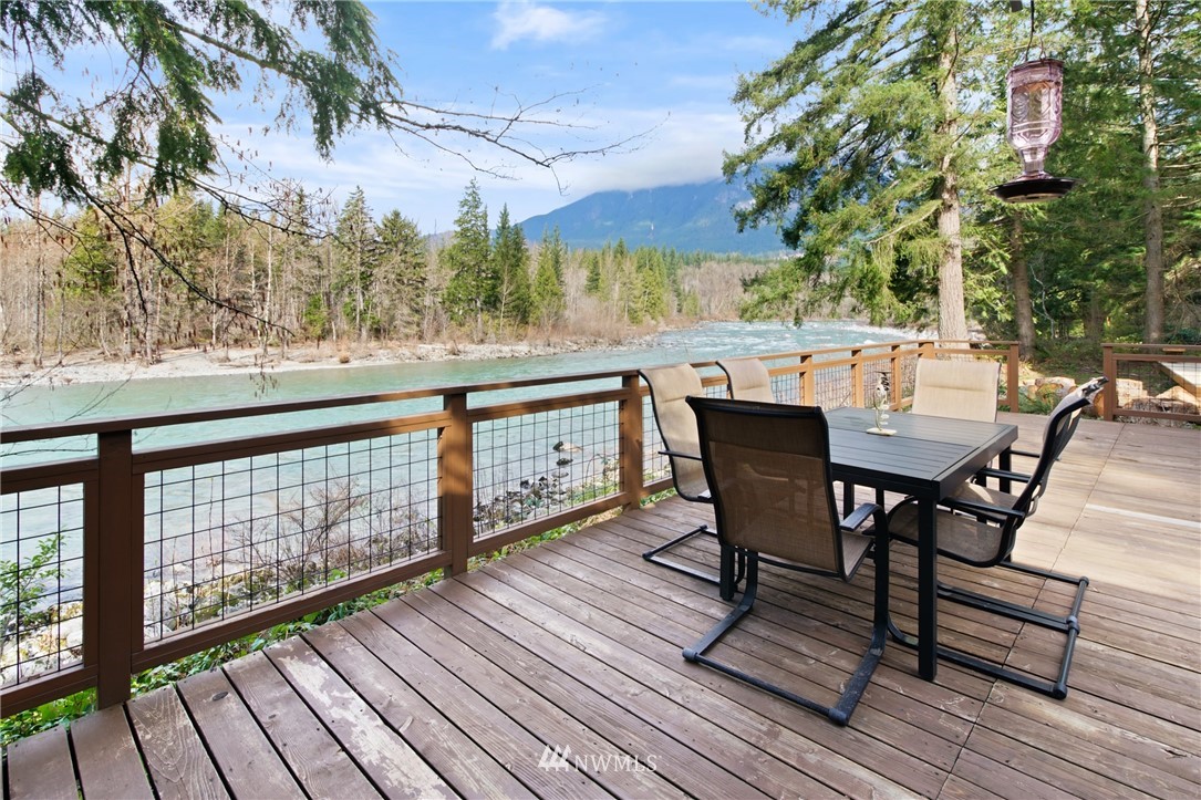 43825 Fir Road Gold Bar, WA 98251 - Photo 6 of 35 a view of a chairs and table on the wooden floor