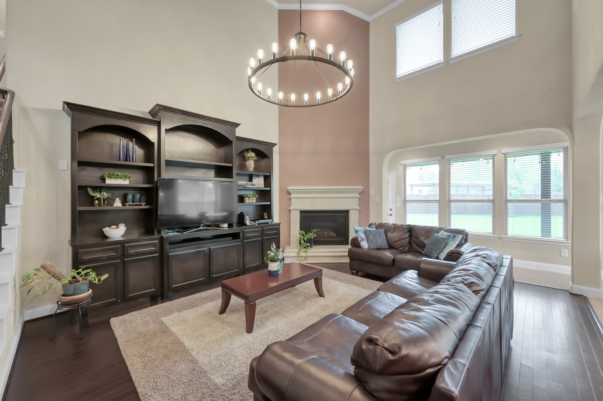 23 Rancher's Trail Tomball, TX 77375 - Photo 8 of 40 Discover the charm of this home featuring a rare fireplace with elegant mantles on both the top and bottom, creating a warm and inviting focal point for your living space.