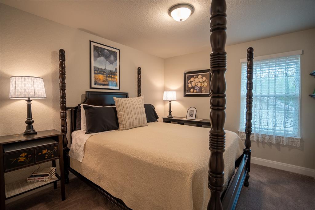 1215 Davis Street Taylor, TX 76574 - Photo 27 of 31 a bedroom with bed and window