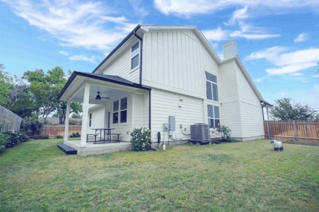 1215 Davis Street Taylor, TX 76574 - Photo 31 of 31 a front view of house with a garden