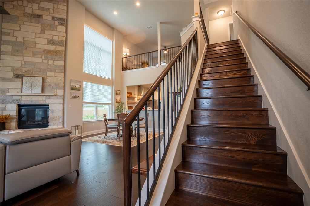 1215 Davis Street Taylor, TX 76574 - Photo 6 of 31 a view of entryway and hall with wooden floor