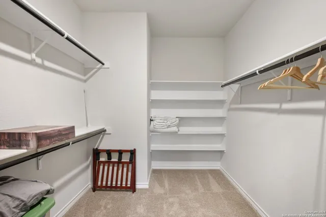 a view of store room with racks on the wall