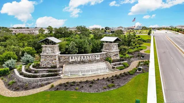 a view of a garden with houses