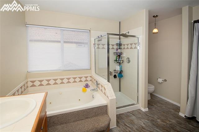 4696 Fencer Road Colorado Springs, CO 80911 - Photo 23 of 33 5 Pc Master Bathroom Walk in Closet