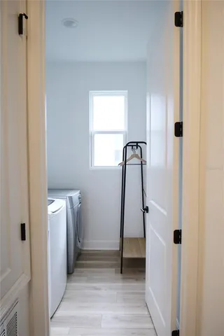 a view of walk in closet with window