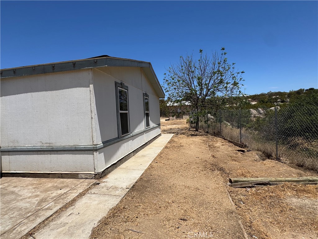 41251 Rope Road Hemet, CA 92544 - Photo 30 of 32 Side view of the Home