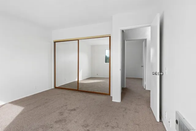 an empty room with closet