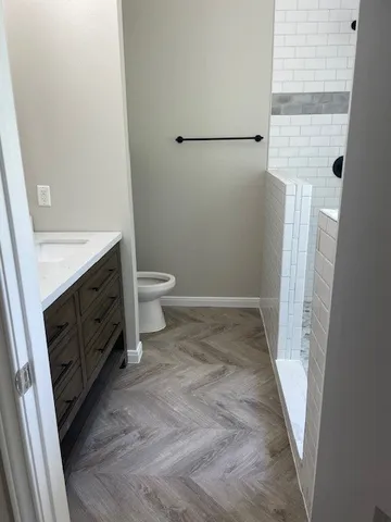a bathroom with a sink and a toilet