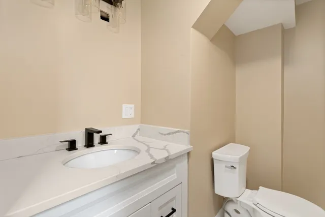 a bathroom with a sink and a toilet