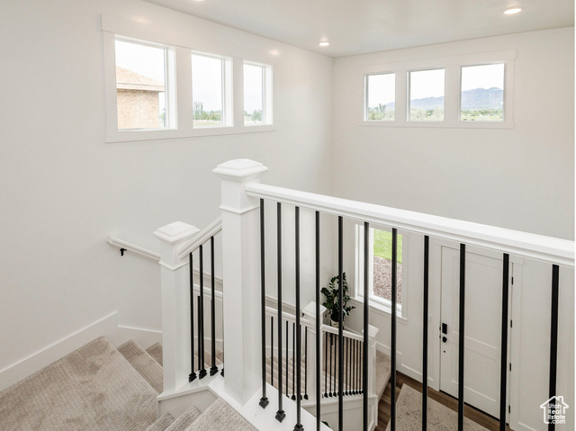 374 Ropelato Drive Nibley, UT 84321 - Photo 6 of 15 Stairway with recessed lighting and baseboards