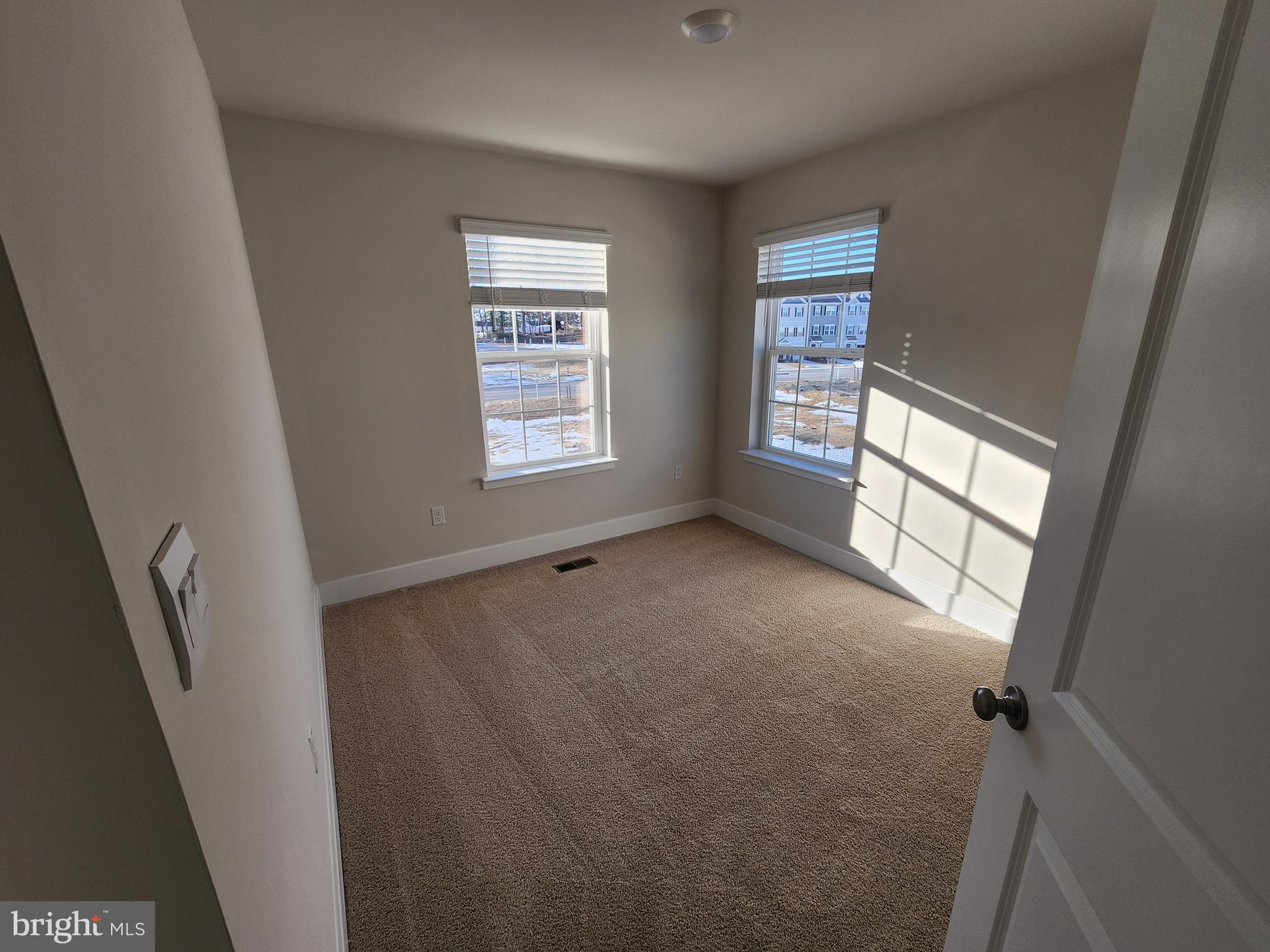 213 Joppa Farm Road Joppa, MD 21085 - Photo 13 of 22 a view of an empty room with a window