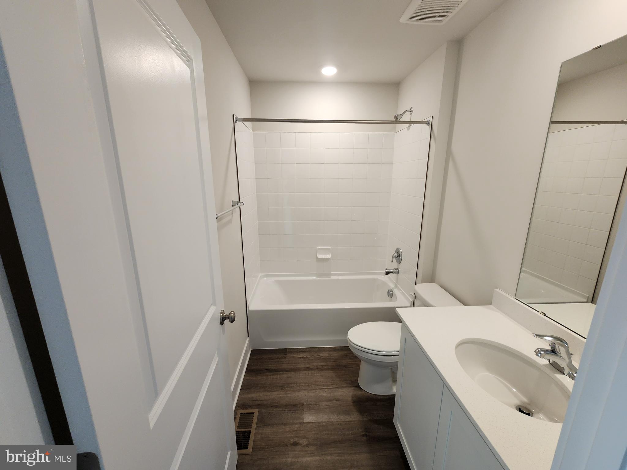 213 Joppa Farm Road Joppa, MD 21085 - Photo 14 of 22 a bathroom with a sink toilet and shower