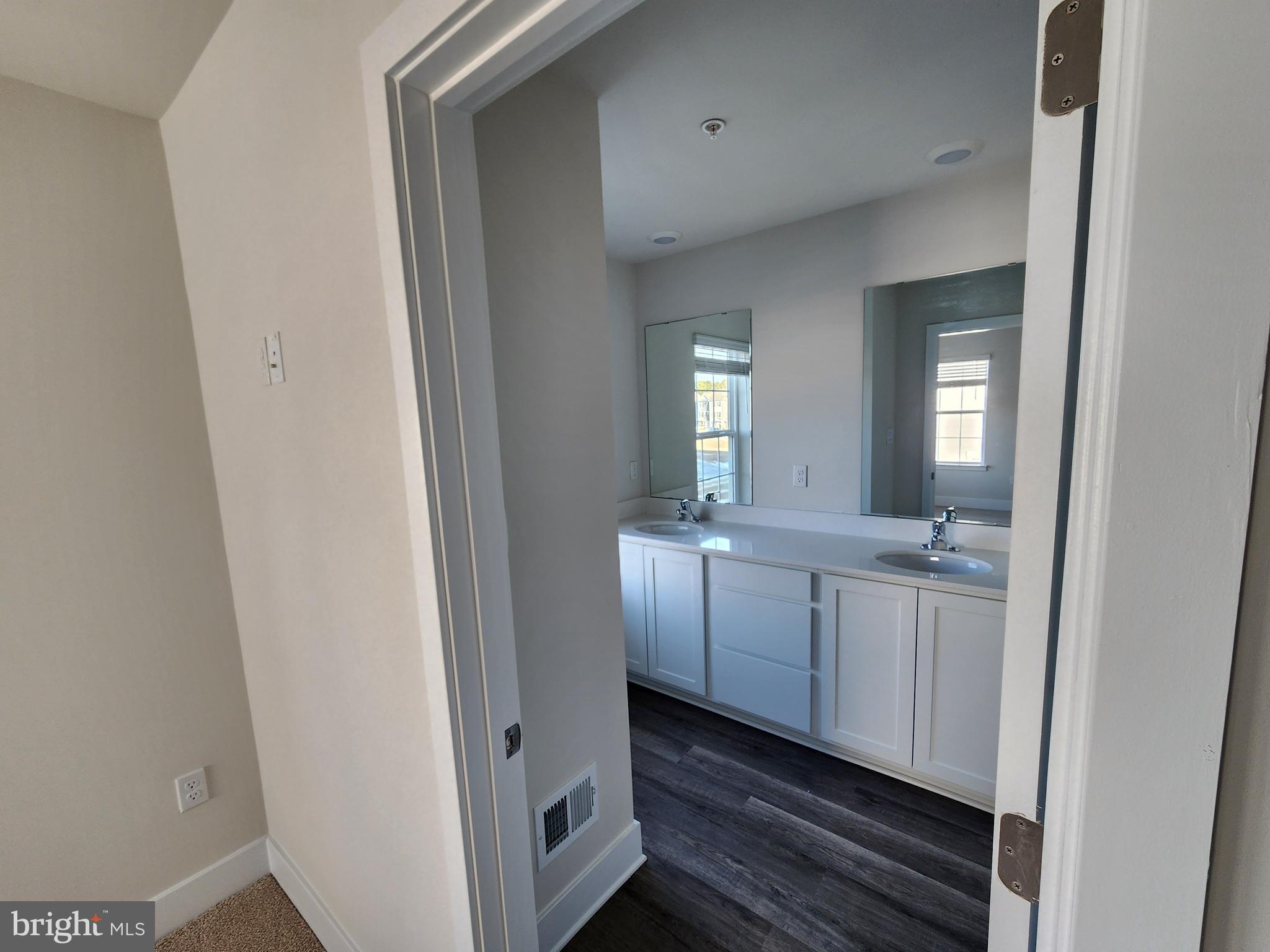 213 Joppa Farm Road Joppa, MD 21085 - Photo 17 of 22 a view of a bathroom from a hallway