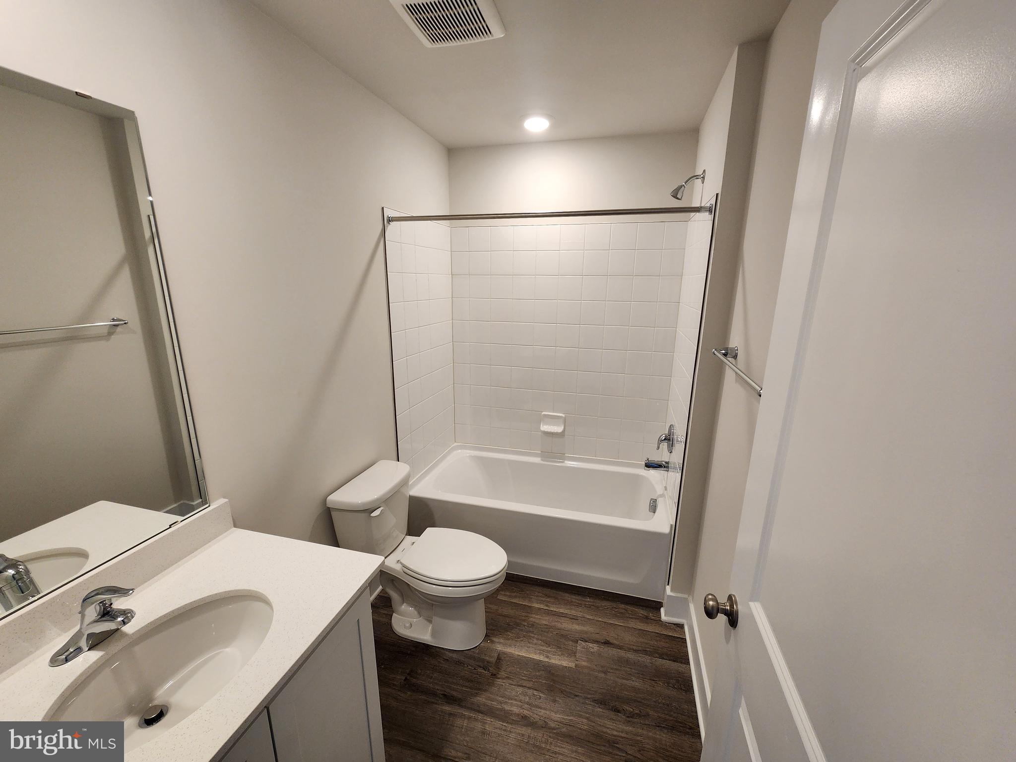 213 Joppa Farm Road Joppa, MD 21085 - Photo 5 of 22 a bathroom with a sink toilet and shower