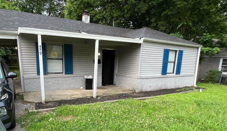 479 King Road Memphis, TN 38109 - Photo 1 of 1 a front view of a house with a yard