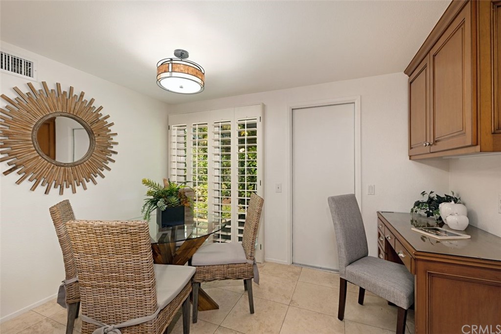 11 Jetty Drive Corona del Mar, CA 92625 - Photo 13 of 44 a dining room with furniture and window