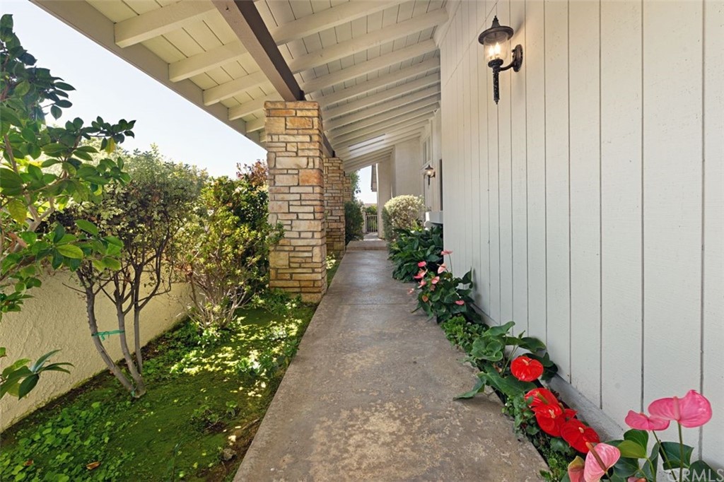 11 Jetty Drive Corona del Mar, CA 92625 - Photo 38 of 44 a view of a pathway that has a flower around