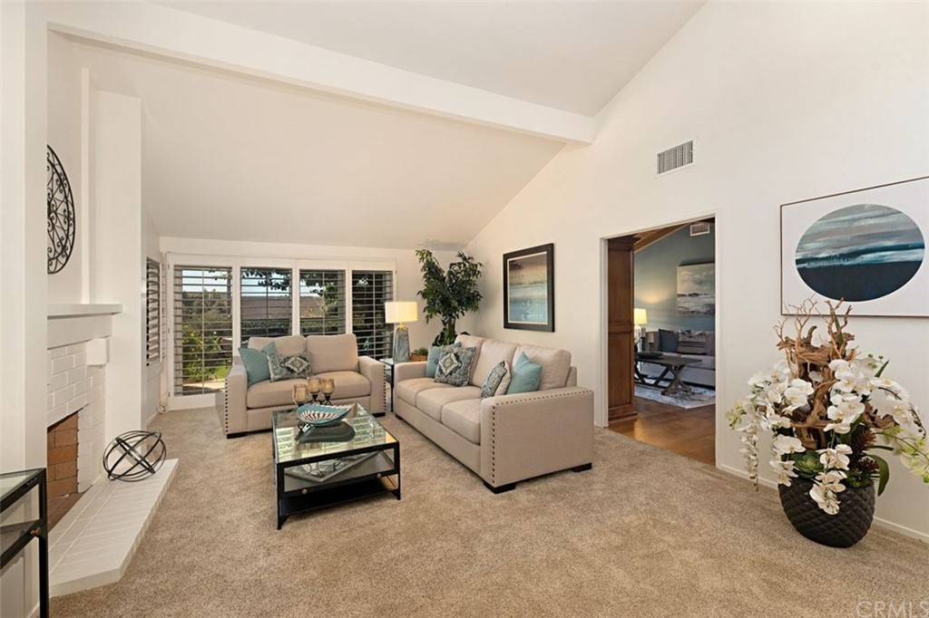 11 Jetty Drive Corona del Mar, CA 92625 - Photo 43 of 44 a living room with furniture and a large window
