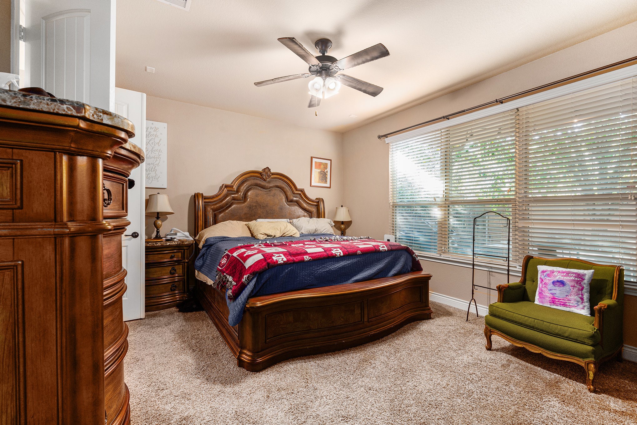 9039 Centennial Drive Conroe, TX 77384 - Photo 6 of 16 a bedroom with a bed and window