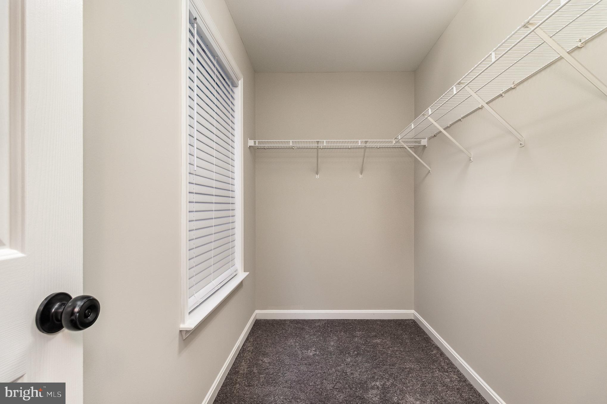 3605 Burton Road Bumpass, VA 23024 - Photo 27 of 44 a view of a closet area with wooden floor