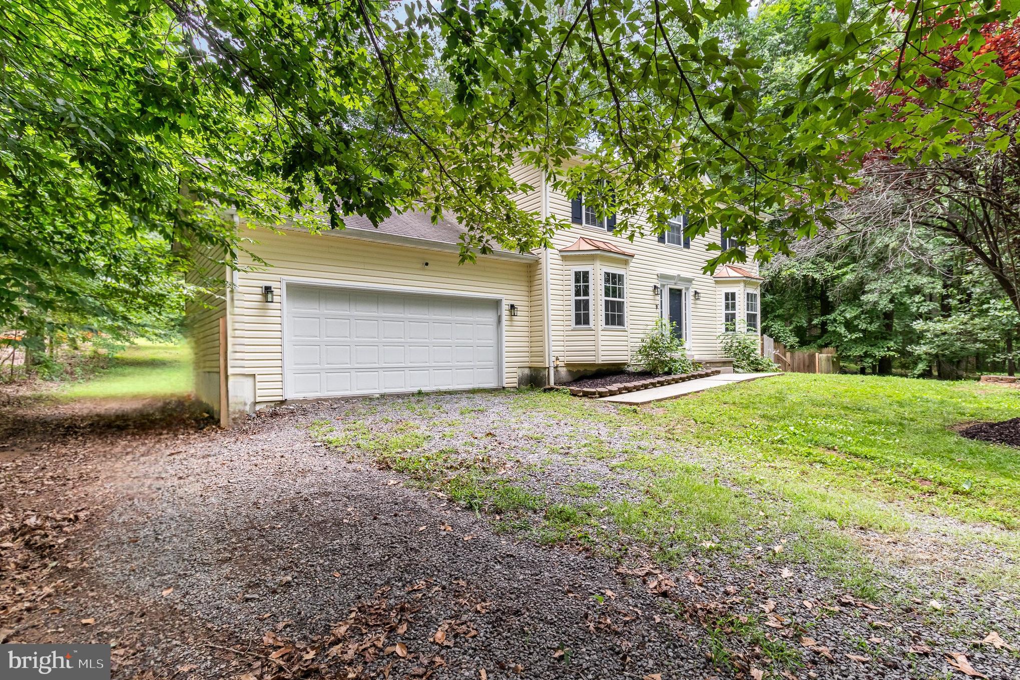 3605 Burton Road Bumpass, VA 23024 - Photo 3 of 44 a front view of house with yard and trees