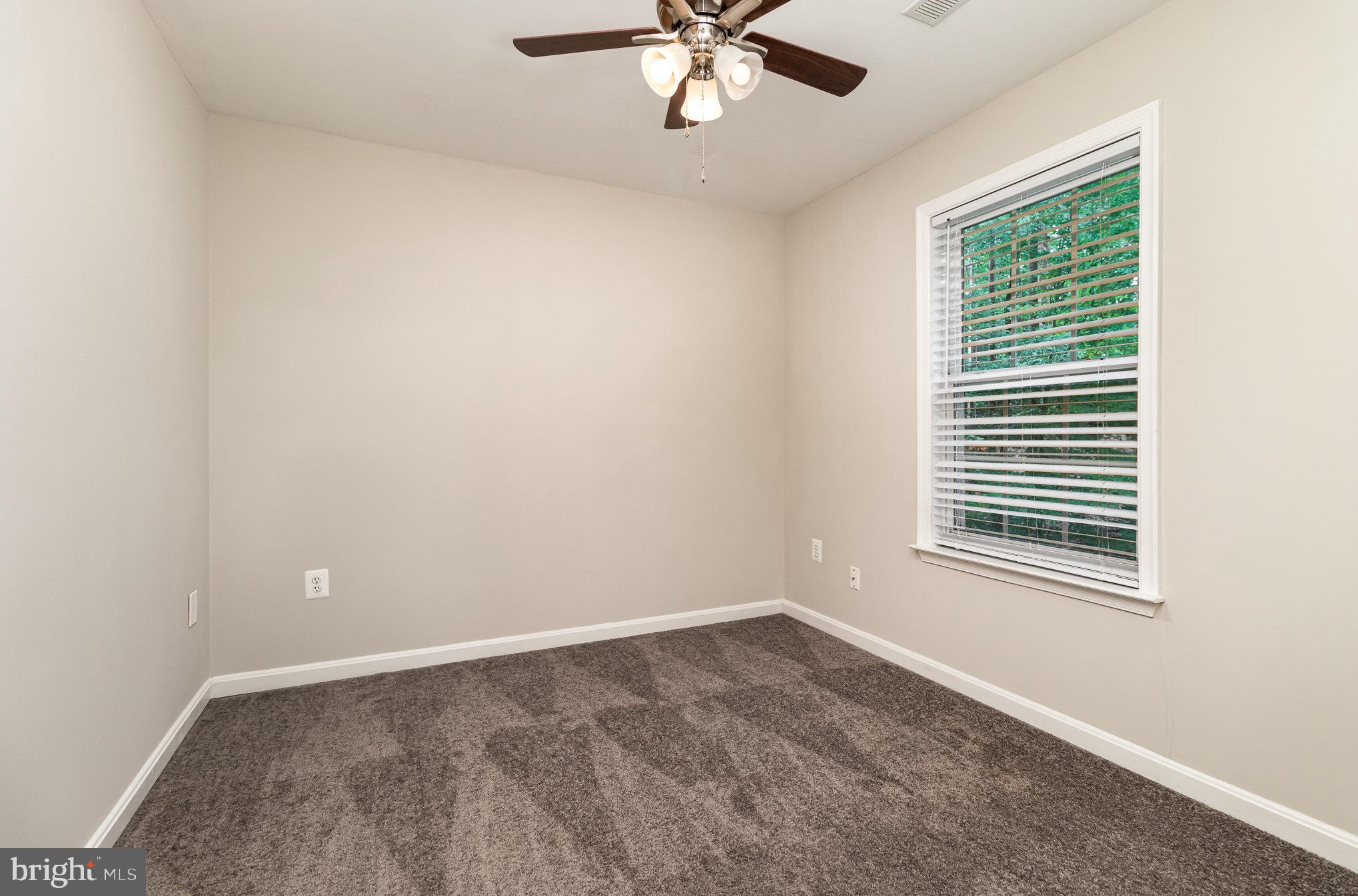 3605 Burton Road Bumpass, VA 23024 - Photo 33 of 44 an empty room with a window