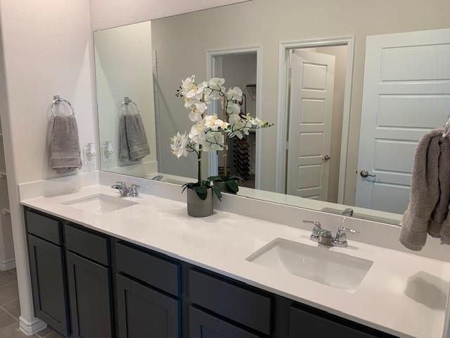 712 Feldspar Way Princeton, TX 75407 - Photo 7 of 12 Dual rectangular undermount sinks set within an expansive white countertop