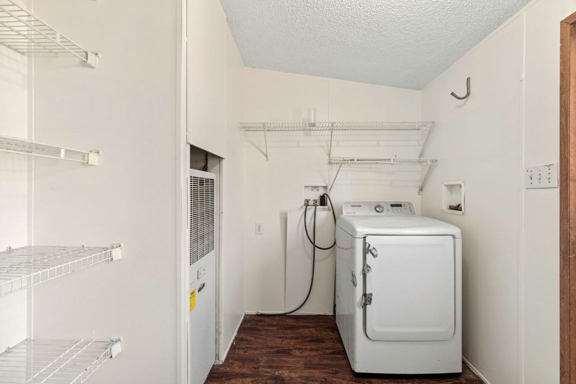 645 Old Luling Road Lockhart, TX 78644 - Photo 12 of 24 a utility room with dryer and washer