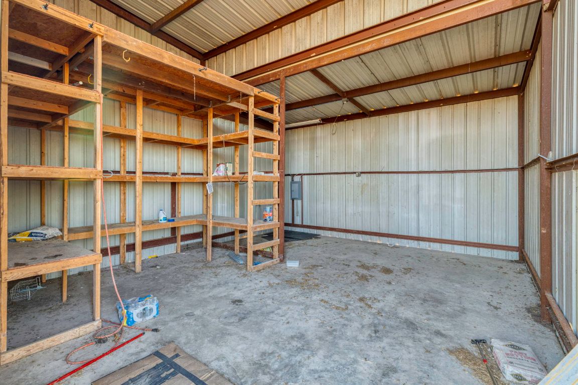 645 Old Luling Road Lockhart, TX 78644 - Photo 21 of 24 a view of an empty room with a rug