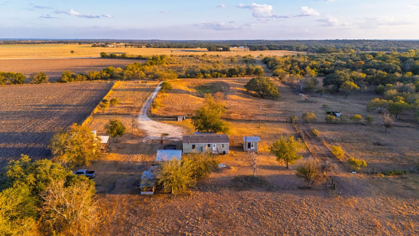 645 Old Luling Road Lockhart, TX 78644 - Photo 24 of 24 an aerial view of residential houses with outdoor space