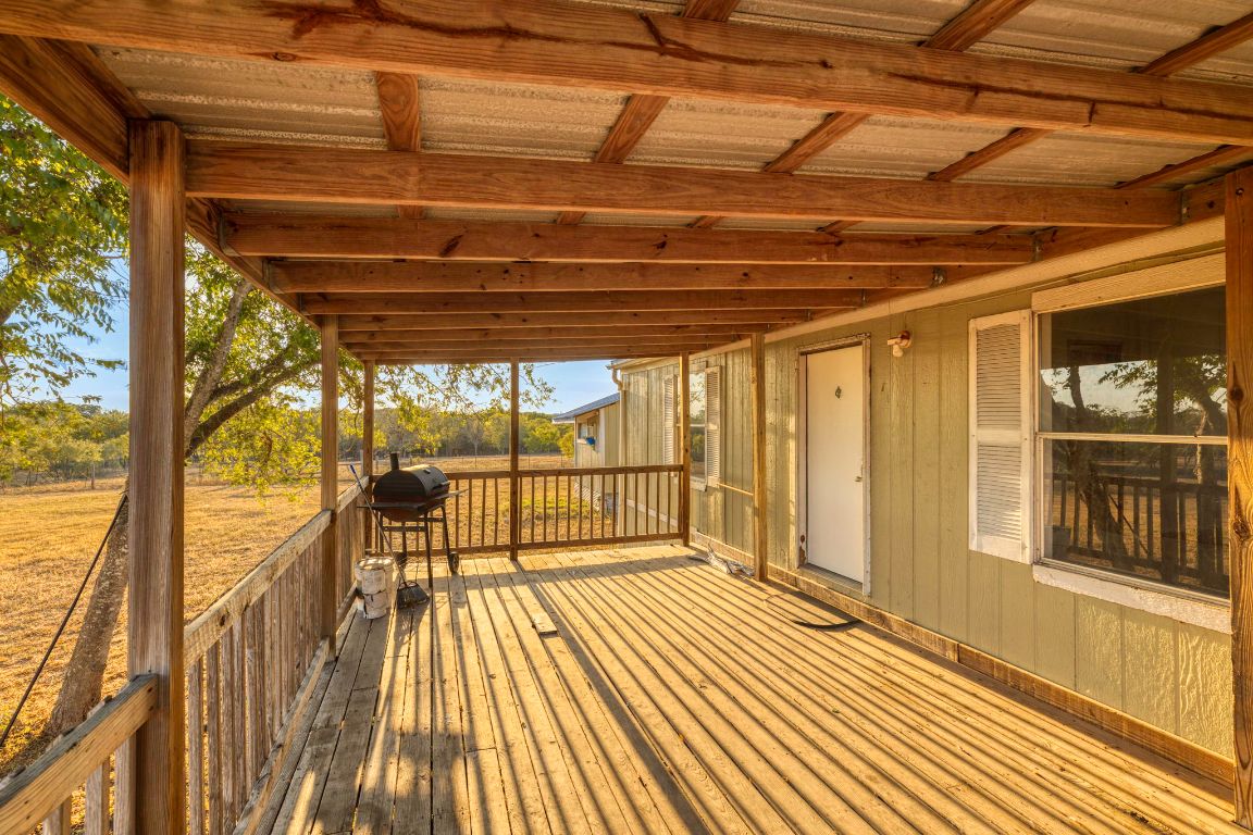 645 Old Luling Road Lockhart, TX 78644 - Photo 3 of 24 a view of empty room with wooden floor