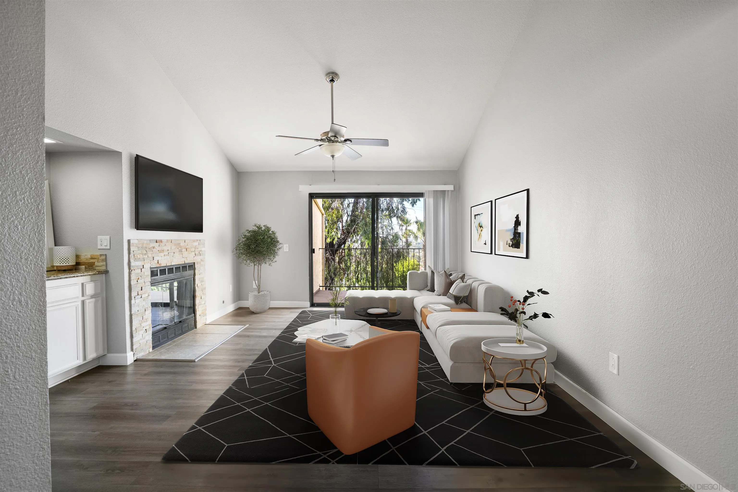 7347 Paseo Verde Carlsbad, CA 92009 - Photo 1 of 27 a living room with fireplace furniture and a flat screen tv