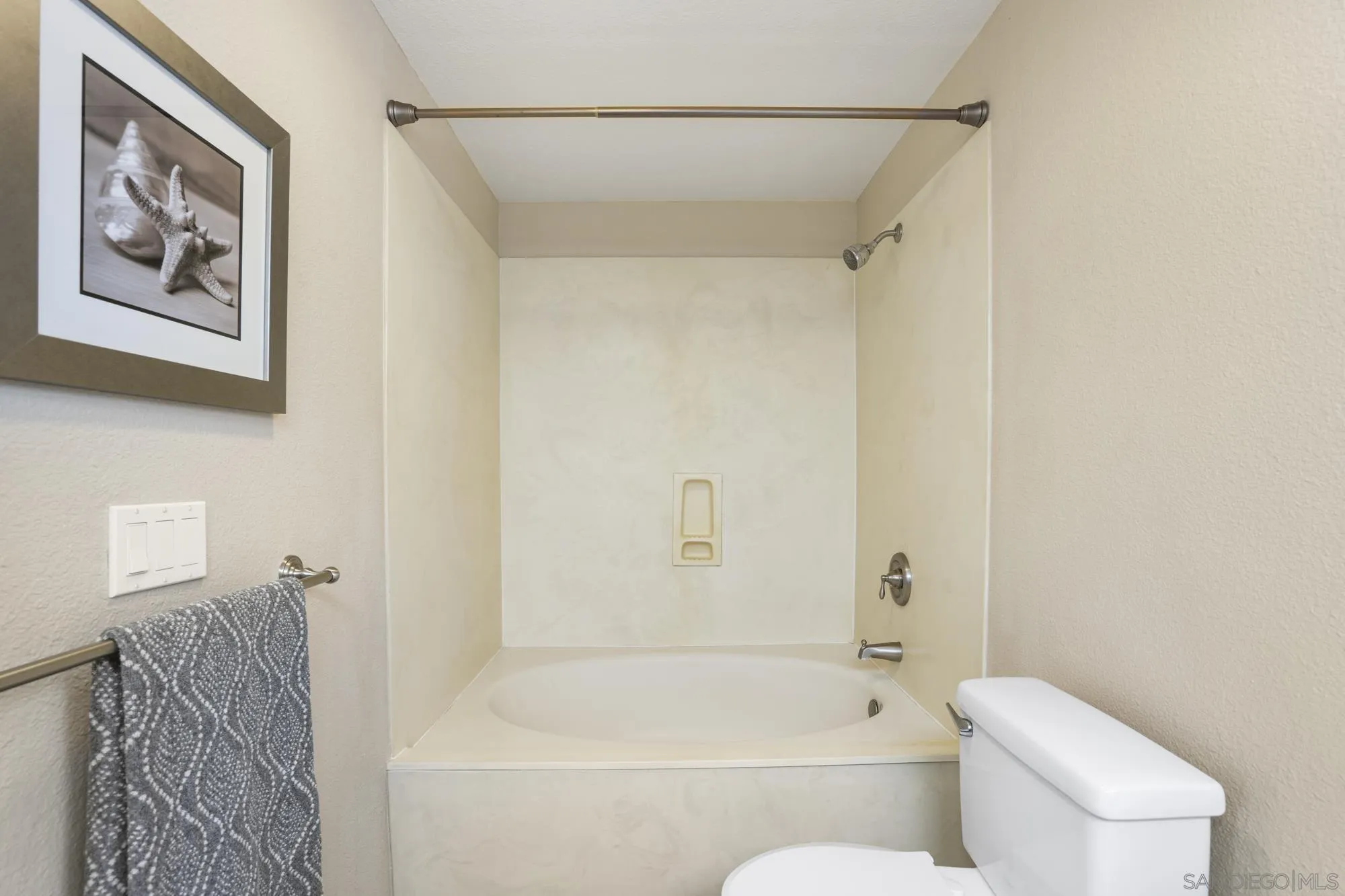 7347 Paseo Verde Carlsbad, CA 92009 - Photo 13 of 27 a bathroom with a toilet and a bathtub