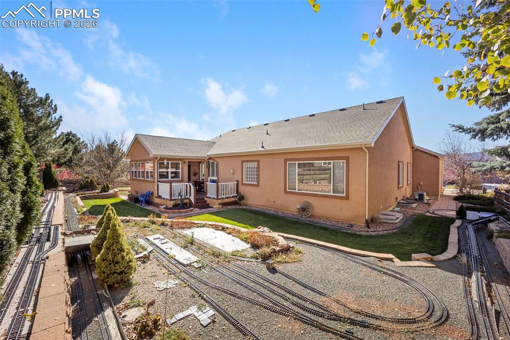 16261 Hobson Place Monument, CO 80132 - Photo 45 of 50 a view of a house with backyard