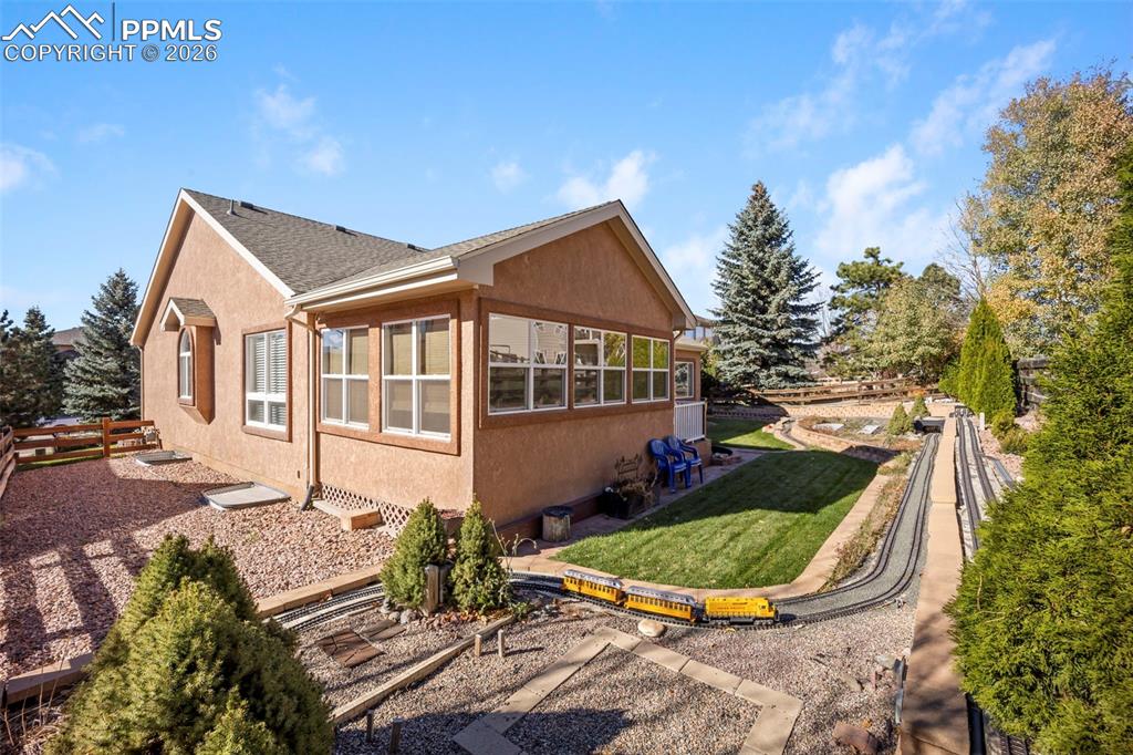 16261 Hobson Place Monument, CO 80132 - Photo 46 of 50 front view of a house with a yard