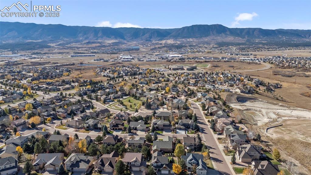 16261 Hobson Place Monument, CO 80132 - Photo 48 of 50 an aerial view of residential house and green space