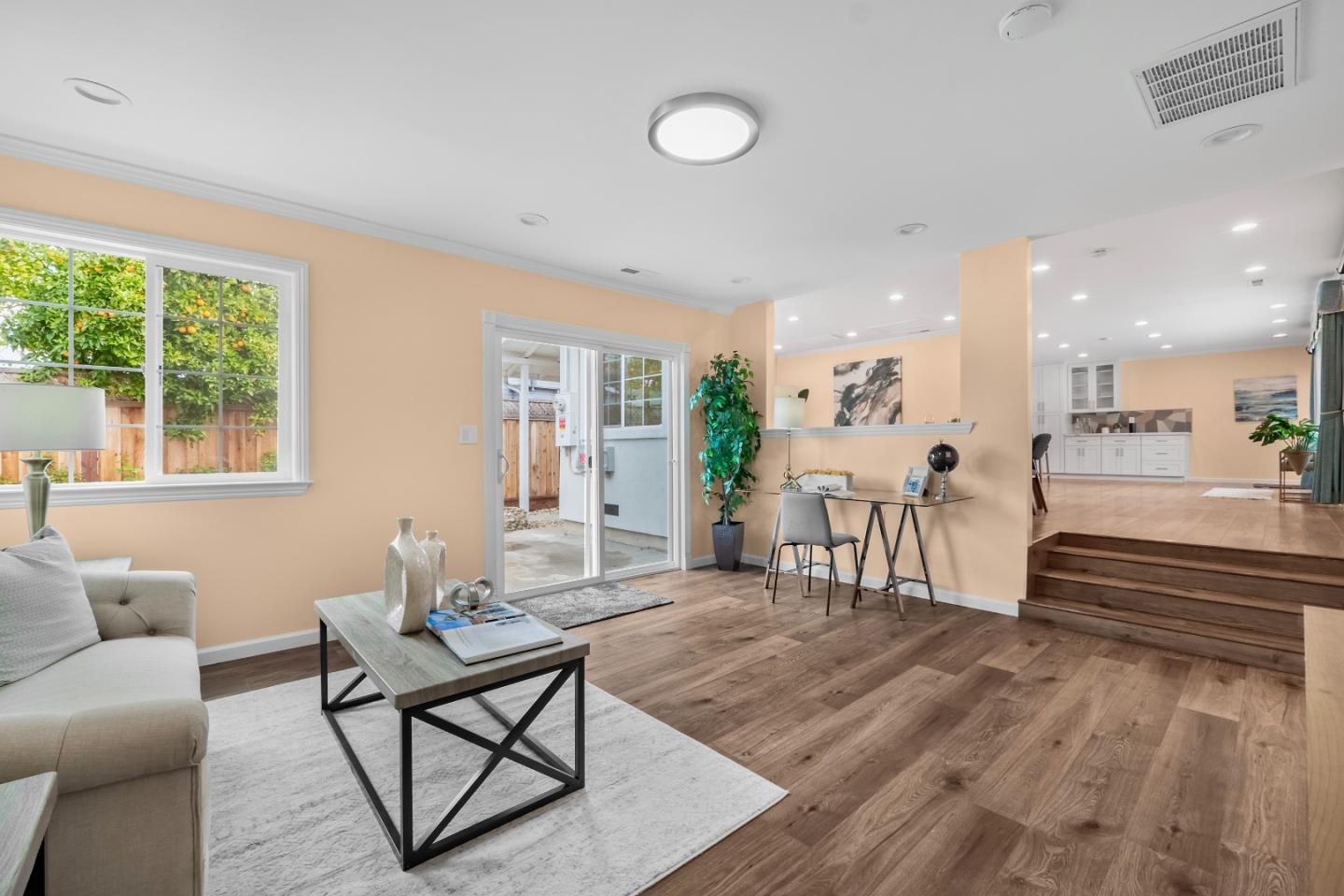 983 Smith Avenue Campbell, CA 95008 - Photo 19 of 57 a living room with furniture and a table