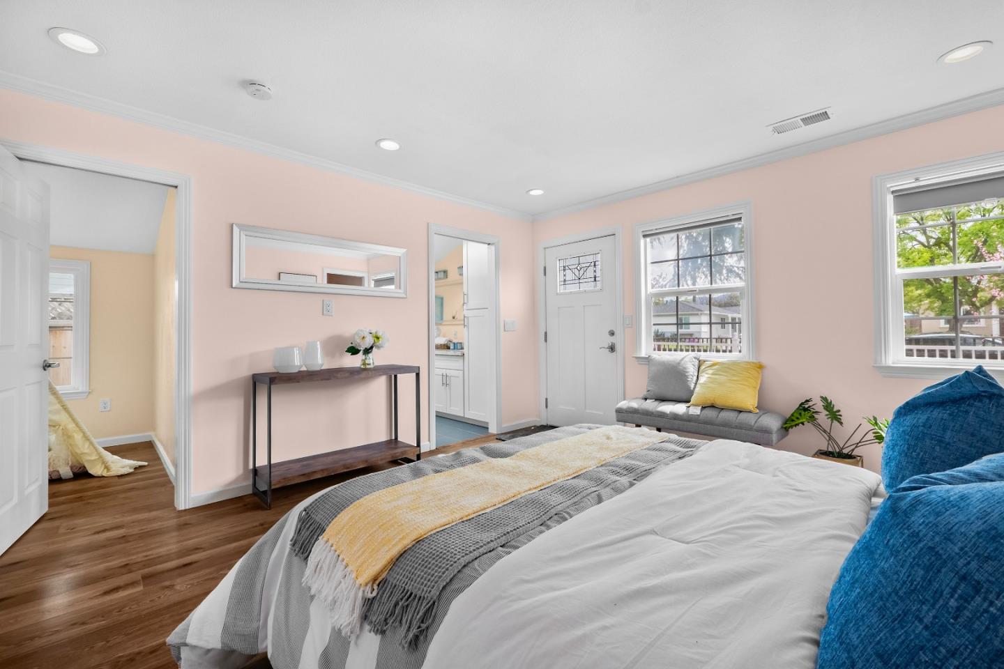 983 Smith Avenue Campbell, CA 95008 - Photo 21 of 57 a bedroom with a bed and wooden floor