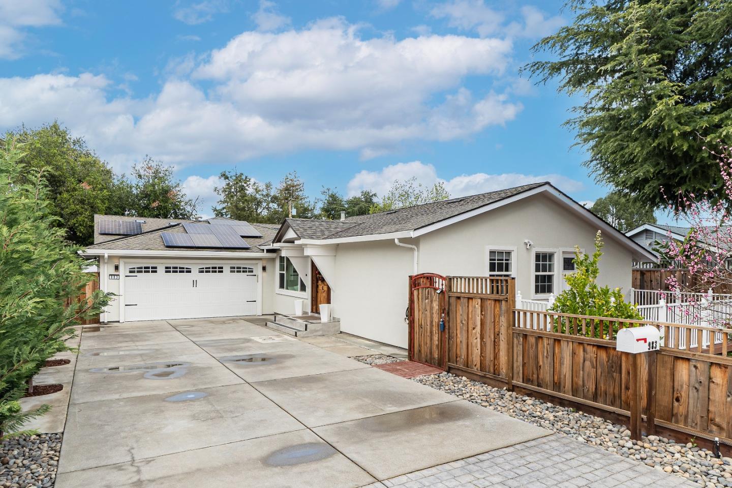 983 Smith Avenue Campbell, CA 95008 - Photo 3 of 57 a view of a house with a backyard