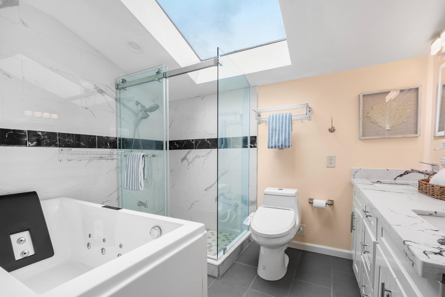 983 Smith Avenue Campbell, CA 95008 - Photo 32 of 57 a bathroom with a toilet sink and a shower