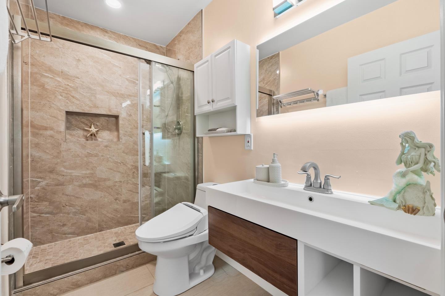 983 Smith Avenue Campbell, CA 95008 - Photo 35 of 57 a bathroom with a sink a toilet and shower