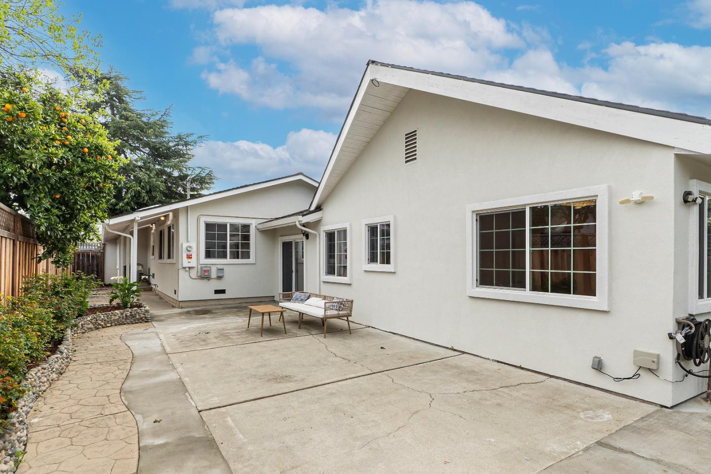 983 Smith Avenue Campbell, CA 95008 - Photo 44 of 57 a house with yard in front of it