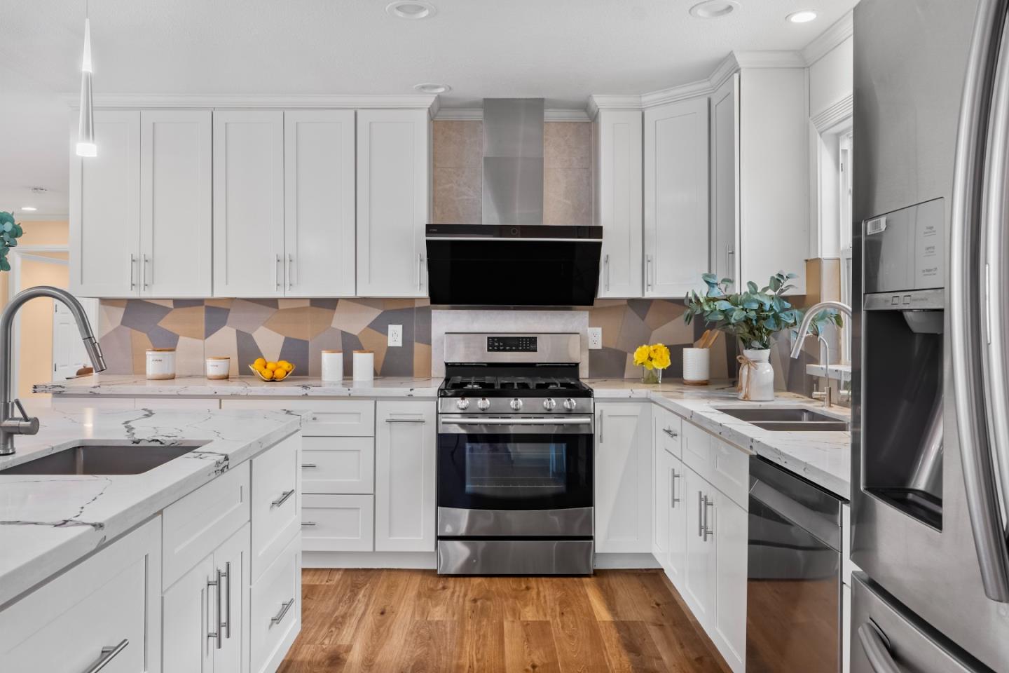 983 Smith Avenue Campbell, CA 95008 - Photo 9 of 57 a kitchen with stainless steel appliances a stove sink and cabinets