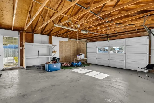 a view of living room and wooden floor