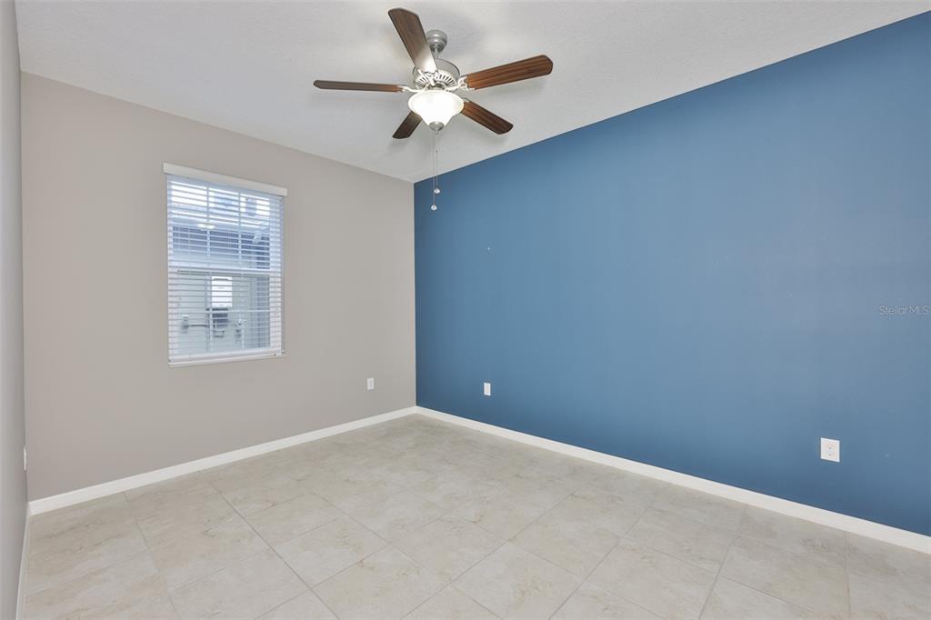 6330 Lantern View Place Apollo Beach, FL 33572 - Photo 14 of 64 an empty room with a window and a fan