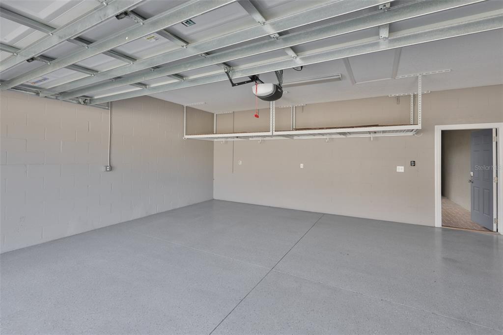 6330 Lantern View Place Apollo Beach, FL 33572 - Photo 38 of 64 a view of a room with racks on the wall