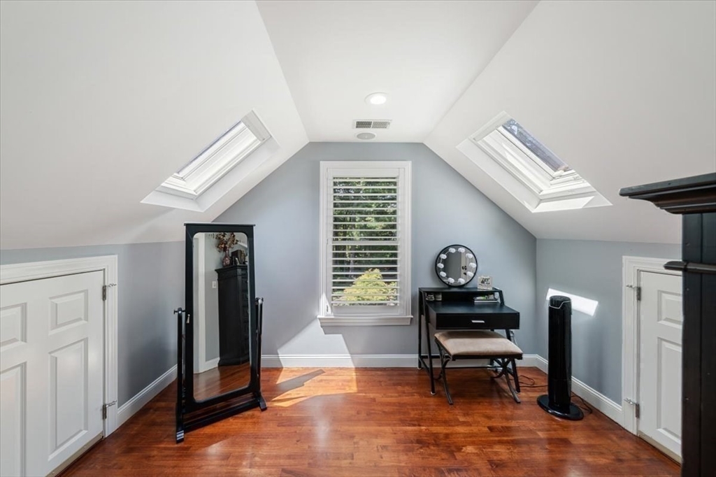 15 A Moccasin Path Natick, MA 01760 - Photo 15 of 42 a living room with furniture and a window