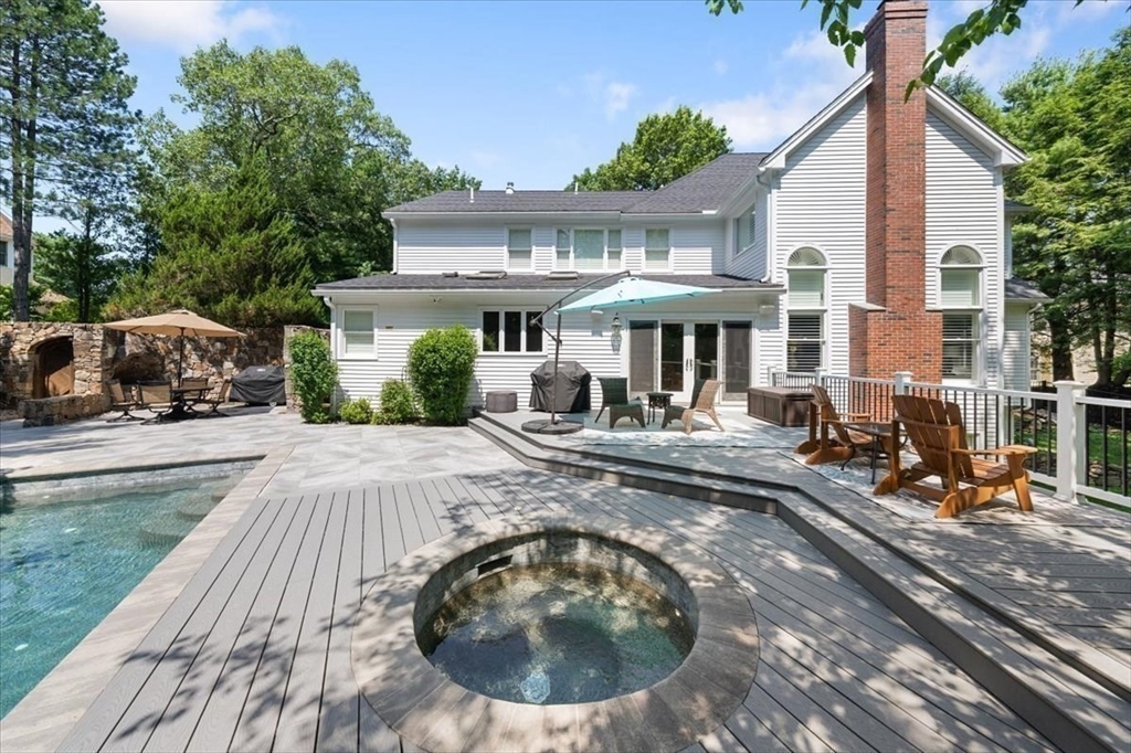 15 A Moccasin Path Natick, MA 01760 - Photo 29 of 42 a view of a house with sitting area and furniture